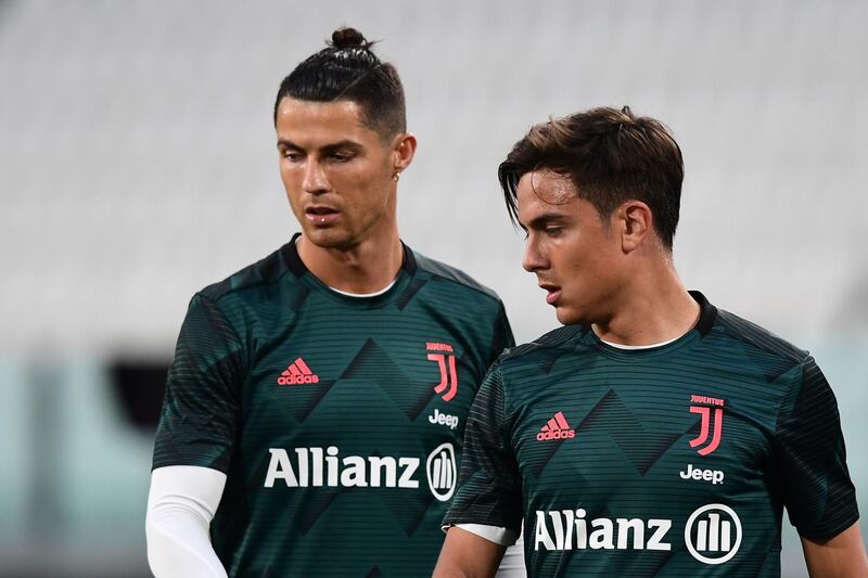 Ronaldo and Argentine forward Paulo Dybala warm up. AFP