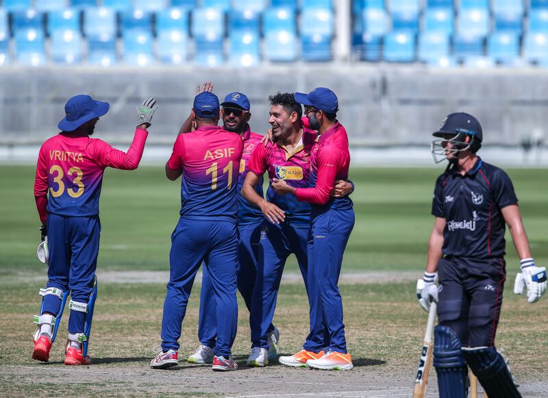 UAE bowled out Namibia for 91 before fighting their way to a one-wicket win