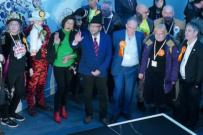 George Galloway, front centre, after being declared the winner in the Rochdale by-election. PA