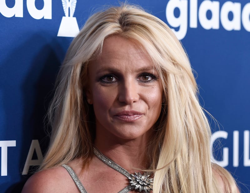 Britney Spears is alleged to have slapped her employee's mobile phone out of their hands during the encounter. AP