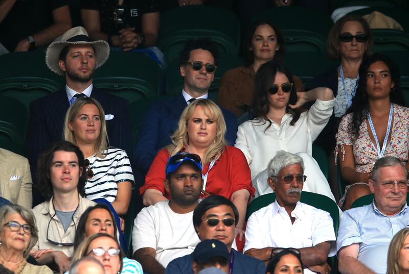 Rebel Wilson, centre, wearing Ralph Lauren, on day seven of the Wimbledon Championships at the All England Lawn Tennis and Croquet Club. PA