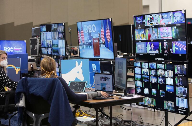 The control room where live feeds are managed is in operation for the first night of the virtual DNC convention at the Wisconsin Center in Milwaukee. AFP