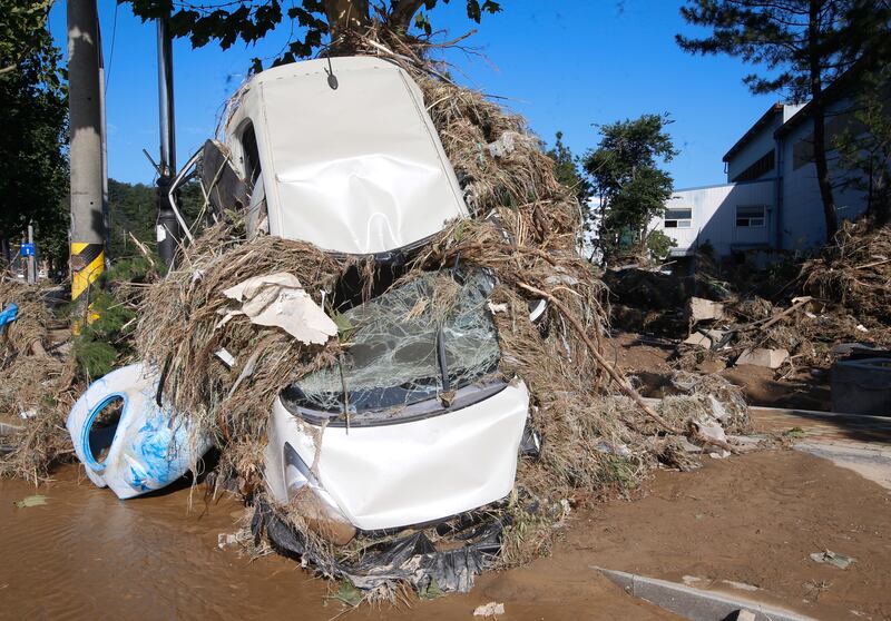 A car damaged by Typhoon Hinnamnor in Pohang, South Korea. EPA