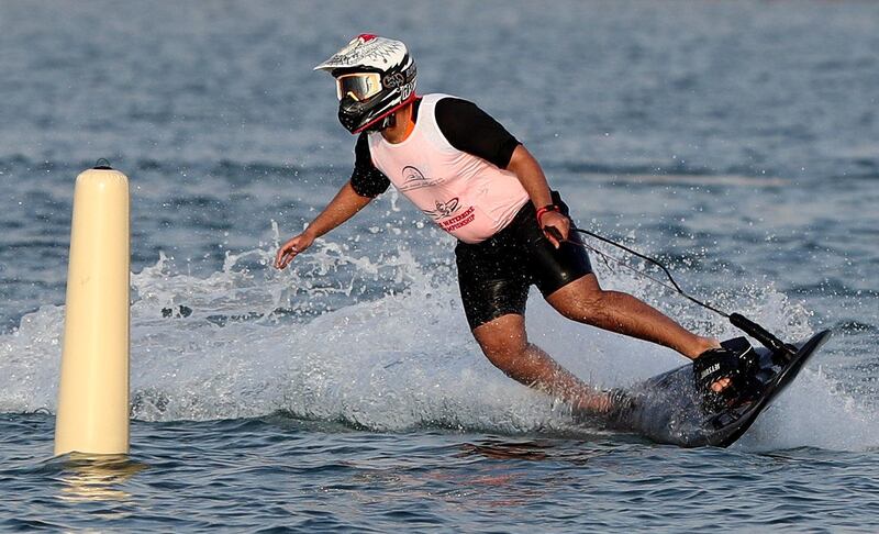Dubai, United Arab Emirates - Reporter: N/A. Sport. People compete in the moto surf section of the Dubai Watersports Summer Week. Thursday, June 25th, 2020. Dubai. Chris Whiteoak / The National