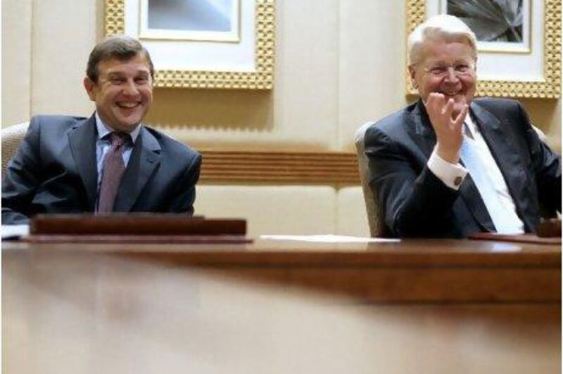 Khalid Irani, Jordan's energy minister, left, and Olafur Ragnar Grimsson, the president of Iceland, at the Emirates Palace yesterday.