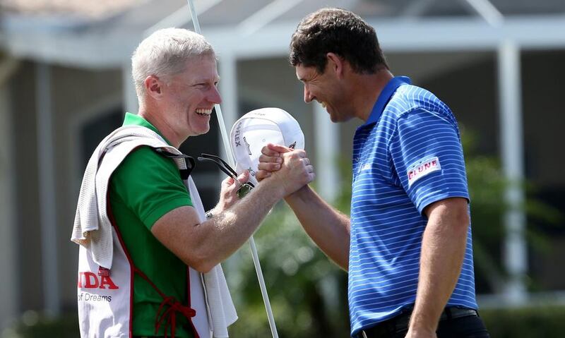 Padraig Harrington celebrates with his caddie after winning on the second play-off hole of the Honda Classic at PGA National Resort & Spa - Champion Course on March 2, 2015 in Palm Beach Gardens, Florida. Sam Greenwood / Getty Images