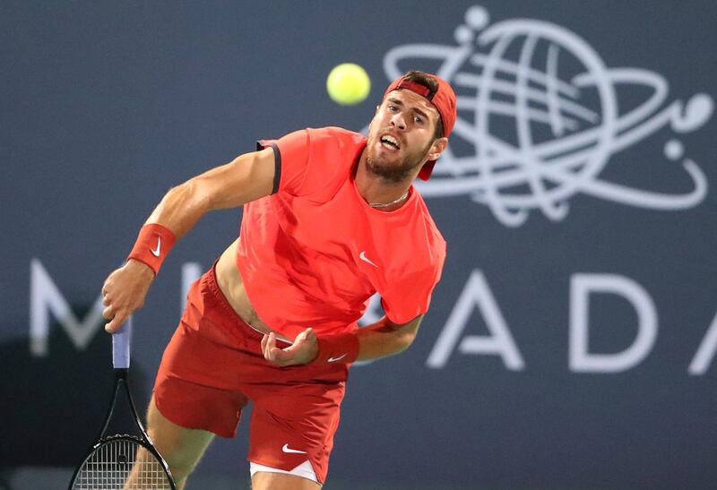 Karen Khachanov returns a shot against Novak Djokovic during their Mubadala World Tennis Championship match at Zayed Sports City. Reuters