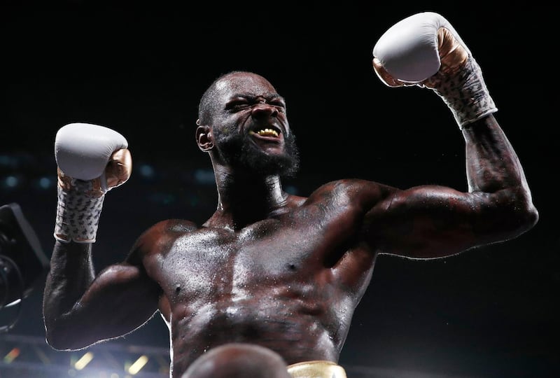 Deontay Wilder celebrates after defeating Luis Ortiz in the WBC heavyweight title boxing match Saturday, Nov. 23, 2019, in Las Vegas. (AP Photo/John Locher)