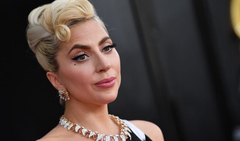 Lady Gaga supported her dog walker during his recovery, he said.. AFP