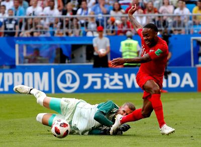 epa06871422 Raheem Sterling of England (R) and goalkeeper Robin Olsen of Sweden in action during the FIFA World Cup 2018 quarter final soccer match between Sweden and England in Samara, Russia, 07 July 2018.

(RESTRICTIONS APPLY: Editorial Use Only, not used in association with any commercial entity - Images must not be used in any form of alert service or push service of any kind including via mobile alert services, downloads to mobile devices or MMS messaging - Images must appear as still images and must not emulate match action video footage - No alteration is made to, and no text or image is superimposed over, any published image which: (a) intentionally obscures or removes a sponsor identification image; or (b) adds or overlays the commercial identification of any third party which is not officially associated with the FIFA World Cup)  EPA/SERGEI ILNITSKY   EDITORIAL USE ONLY