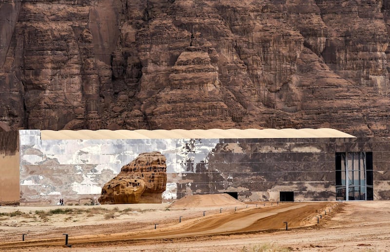 This picture taken on January 5, 2019 shows a view of the new purpose-built Maraya (Arabic for "Mirror") concert hall hosting the first "Winter at Tantora" music carnival in the ruins of Al-Ula, a UNESCO World Heritage site in northwestern Saudi Arabia. - Bathed in light, musicians belt out melodies among pre-Islamic desert ruins in northwestern Saudi Arabia, a heritage trove at the centre of efforts to put the kingdom on the tourism map. Hosted by the Al-Ula governorate -- where Nabatean tombs and rock art are chiseled into caramel-hued cliffs -- "Winter at Tantora" is the latest music carnival in the Islamic kingdom, where such events were unheard of just two years ago. (Photo by FAYEZ NURELDINE / AFP)