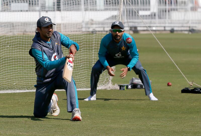 Sarfraz Ahmed, left, and Babar Azam practise fielding in Rawalpindi on Sunday. AP