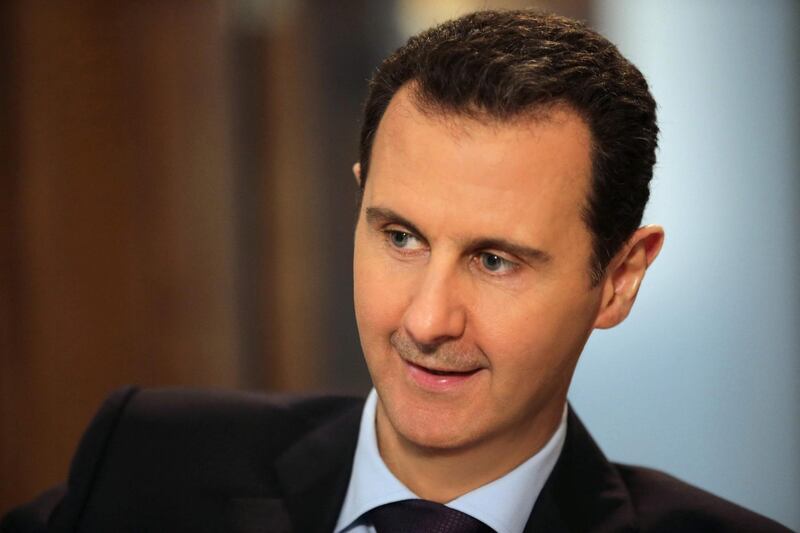 (FILES) In this file photo taken on February 11, 2016 Syrian President Bashar al-Assad gives an exclusive interview to AFP in the capital Damascus. A decade of war may have ravaged his country, but Syria's President Bashar al-Assad has clung to power and looks determined to cement his position in presidential elections this year. / AFP / JOSEPH EID
