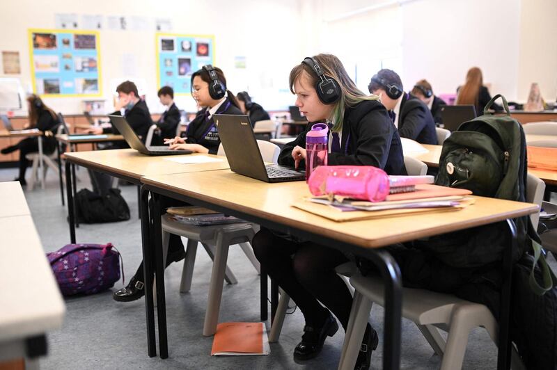 Year 9 students take part in an online class at Park Lane Academy in Halifax. AFP