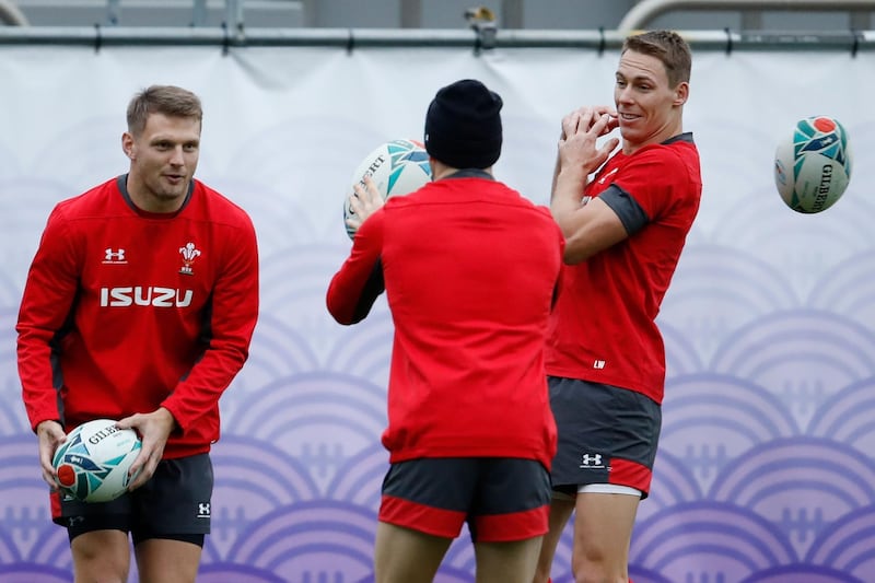 Wales' fly-half Dan Biggar, Wales' scrum-half Gareth Davies (C) and Wales' full back Liam Williams take part in a training session at Prince Chichibu Memorial Rugby Ground in Tokyo ahead of their Japan 2019 Rugby World Cup semi-final against South Africa. AFP