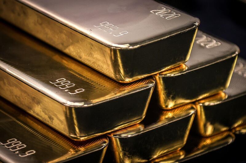 TOPSHOT - Gold bullion bars are pictured after being inspected and polished at the ABC Refinery in Sydney on August 5, 2020. Gold prices hit 2,000 USD an ounce on markets for the first time on August 4, the latest surge in a commodity seen as a refuge amid economic uncertainty. / AFP / DAVID GRAY
