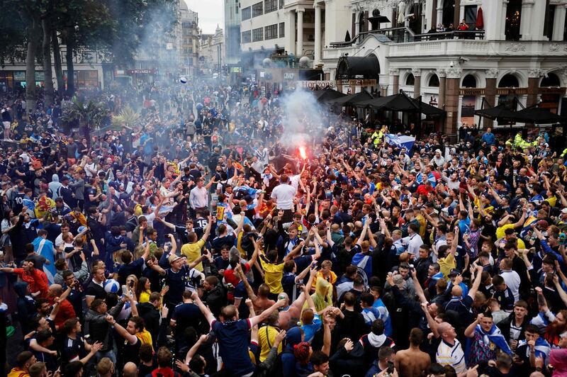 Scotland supporters gather in Leicester Square in central London ahead of the Euro 2020 match against England on Friday, June 18. AFP