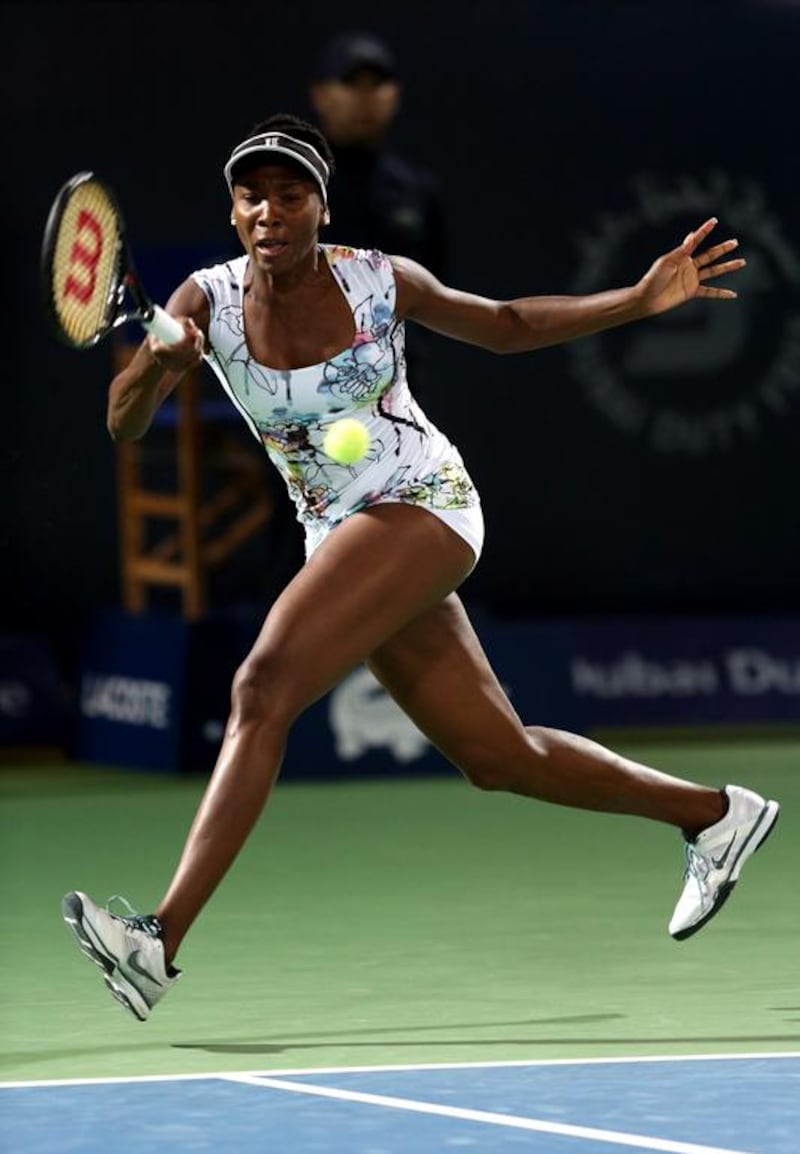 Venus Williams of the USA in action against Alize Cornet of France during the final of the Dubai Dury Free Tennis Championship on February 22, 2014. Getty Images