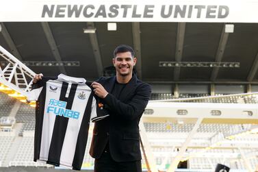 Newcastle United's new signing Bruno Guimaraes poses with a shirt following a press conference at St James' Park, Newcastle upon Tyne. Picture date Monday February 7, 2022.