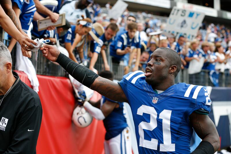 Vontae Davis gives his gloves to a fan after an NFL game between Indianapolis Colts and Tennessee Titans in 2015. Davis was found dead in his South Florida home on Monday. AP