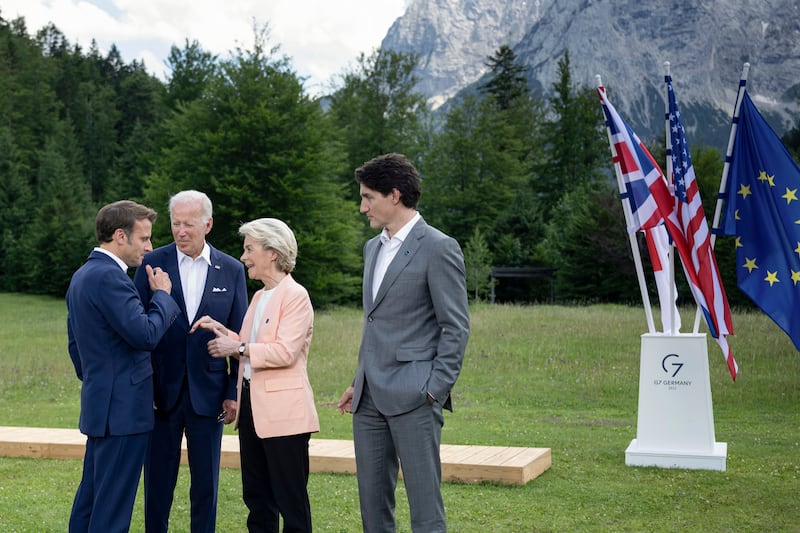 Mr Macron, Mr Biden, Ms von der Leyen and Mr Trudeau. AP