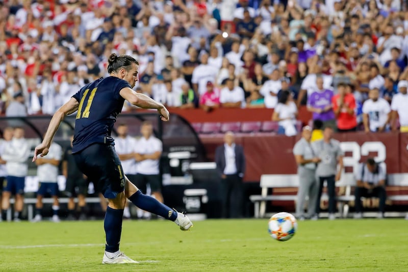 Real Madrid forward Gareth Bale sees his penalty kick saved in the shoot-out. AFP