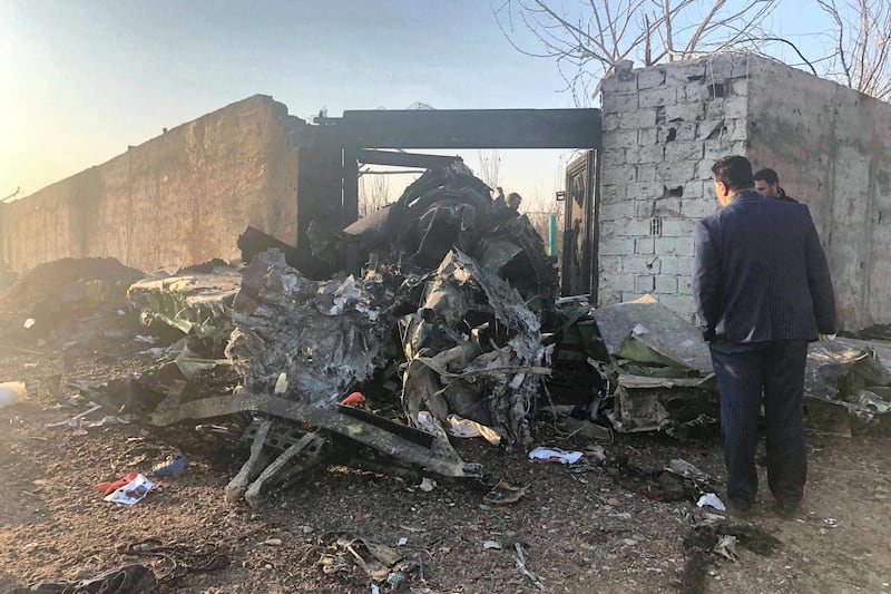 Debris is seen from a plane crash on the outskirts of Tehran, Iran, Wednesday, Jan. 8, 2019. A Ukrainian airplane carrying at least 170 people crashed on Wednesday shortly after takeoff from Tehran‚Äôs main airport, killing all onboard, state TV reported. (AP Photos/Mohammad Nasiri)