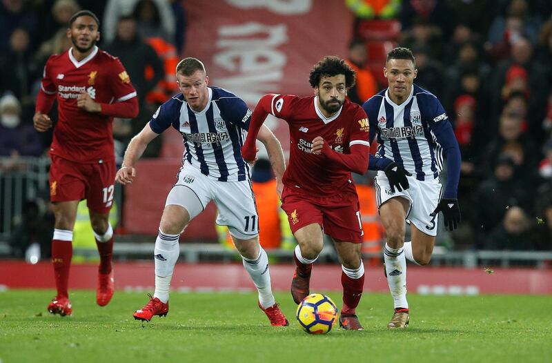 Soccer Football - Premier League - Liverpool vs West Bromwich Albion - Anfield, Liverpool, Britain - December 13, 2017   Liverpool's Mohamed Salah in action with West Bromwich Albion's Chris Brunt and Kieran Gibbs    REUTERS/Andrew Yates    EDITORIAL USE ONLY. No use with unauthorized audio, video, data, fixture lists, club/league logos or "live" services. Online in-match use limited to 75 images, no video emulation. No use in betting, games or single club/league/player publications.  Please contact your account representative for further details.