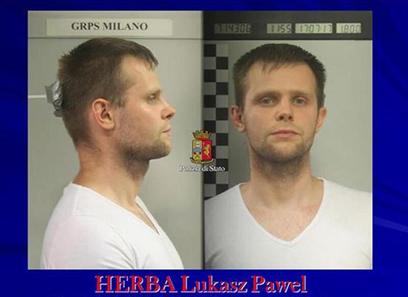 Photo released by police of a man identified as identified as Lukasz Pawel Herba, a Polish citizen with British residency, who has been arrested in the alleged kidnapping of a young British model who thought she was coming to Milan for a photo shoot, but instead was drugged, hustled away in a suitcase and handcuffed in a house in northern Italy before being released, Milan police said Saturday, Aug. 5, 2017. (Italian Police Photo via AP)