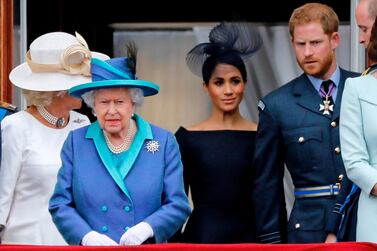 (L-R) The Duchess of Cornwall, Queen Elizabeth II, the Duchess of Sussex and Prince Harry at Buckingham Palace in July 2018. AFP
