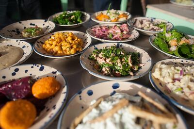 Dishes of cold meze are served at a restaurant in Israel. Photographer: Geraldine Hope Ghelli/Bloomberg