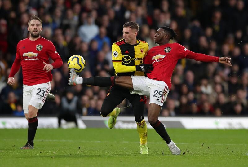 Soccer Football - Premier League - Watford v Manchester United - Vicarage Road, Watford, Britain - December 22, 2019 Watford's Gerard Deulofeu in action with Manchester United's Aaron Wan-Bissaka REUTERS/David Klein EDITORIAL USE ONLY. No use with unauthorized audio, video, data, fixture lists, club/league logos or "live" services. Online in-match use limited to 75 images, no video emulation. No use in betting, games or single club/league/player publications. Please contact your account representative for further details.
