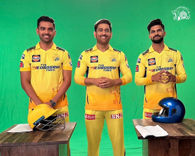 Chennai Super Kings captain MS Dhoni, centre, with their jersey for IPL 2023. @ChennaiIPL / Twitter