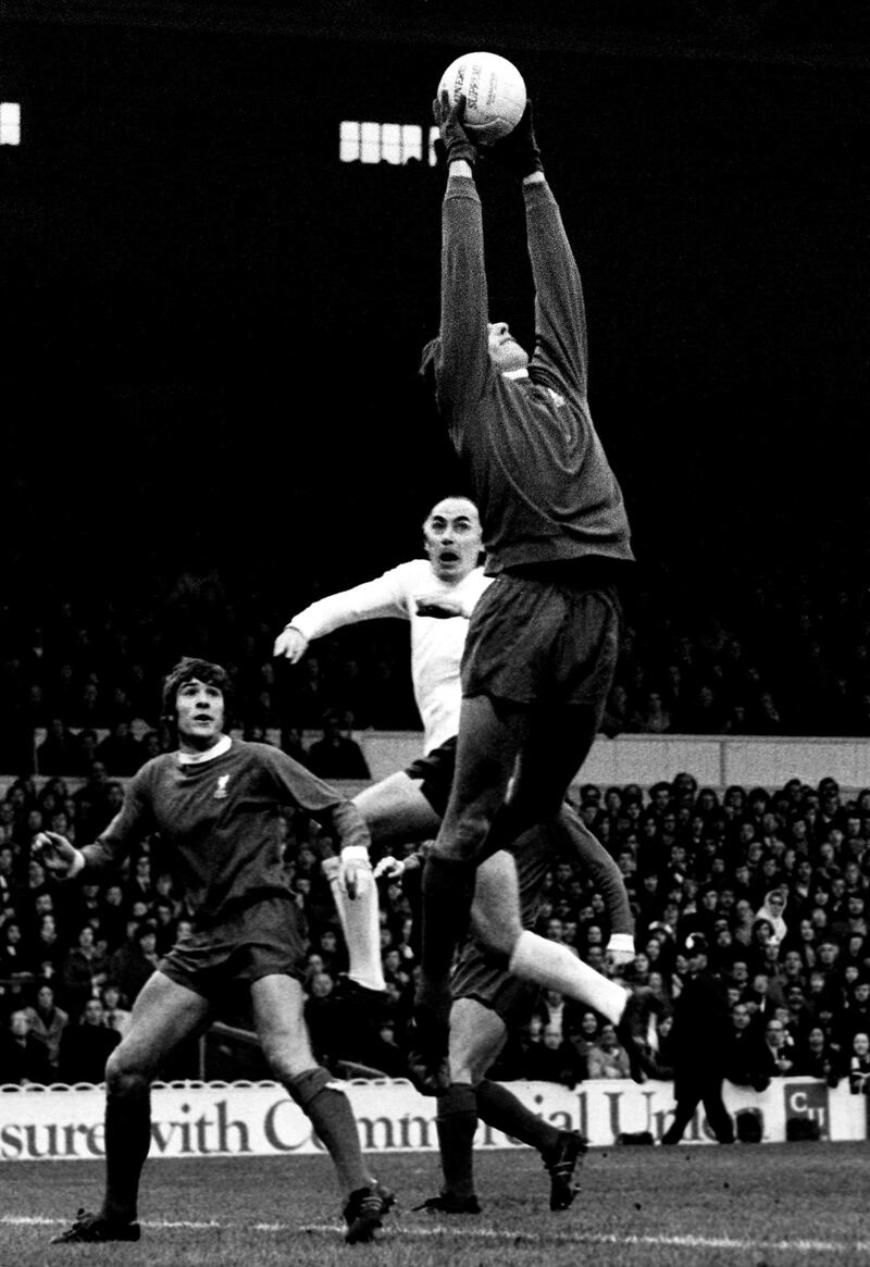 File photo dated 25-11-1972 - Liverpool goalkeeper Ray Clemence catches the ball ahead of Tottenham Hotspur's Alan Gilzean. PA Photo