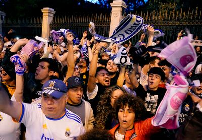 Real Madrid fans celebrate winning La Liga at Cibeles fountain in Madrid. Reuters