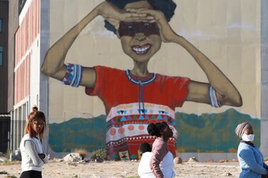 Women queue alongside a testing clinic in Khayelitsha, Cape Town, South Africa, April 2. AP 