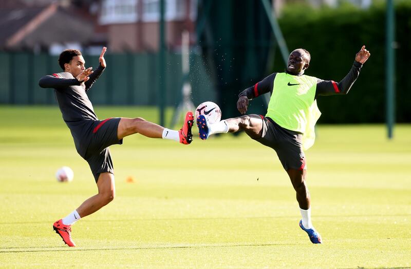 LIVERPOOL, ENGLAND - SEPTEMBER 25: (THE SUN OUT, THE SUN ON SUNDAY OUT) Trent Alexander-Arnold and Sadio Mane of Liverpool during the training session at Melwood Training Ground on September 25, 2020 in Liverpool, England. (Photo by Andrew Powell/Liverpool FC via Getty Images)