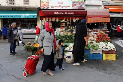 People shop at a market in Tunis, Tunisia November 20, 2019. Picture taken November 20, 2019. REUTERS/Zoubeir Souissi