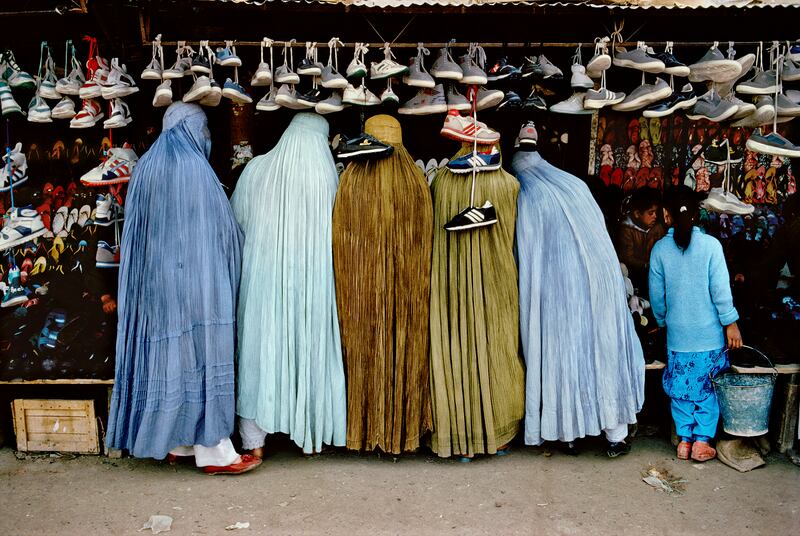 'Afghan Women at Shoe Store. Kabul, Afghanistan, 1992'.