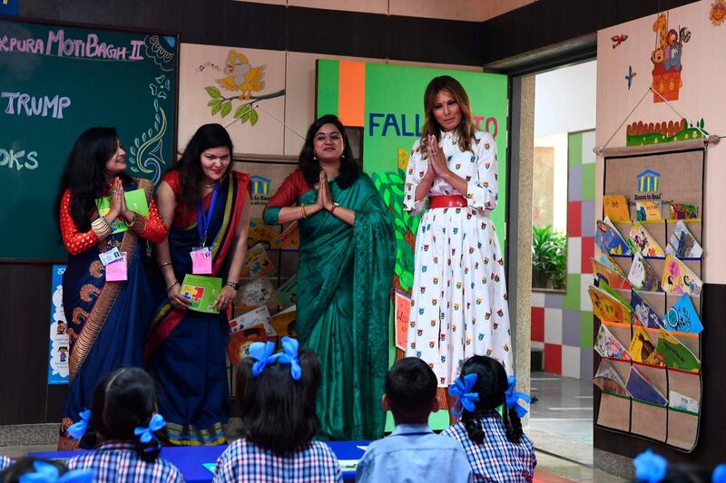 US First Lady Melania Trump greets in a classroom with teachers and students during her visit at Sarvodaya Co-Ed Senior Secondary School, in New Delhi on February 25, 2020. US President Donald Trump moves from sightseeing and speech-making to tough trade talks in India on February 25, as First Lady Melania visits a Delhi school to witness a "happiness class". / AFP / Sajjad  HUSSAIN
