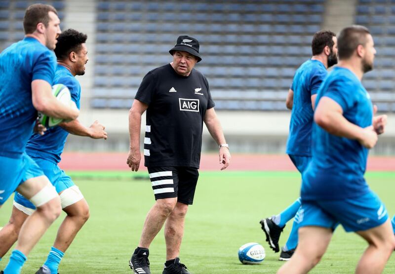 New Zealand  head coach Steve Hansen, centre, watches his players during training at Kashiwanoha Park Stadium. AFP