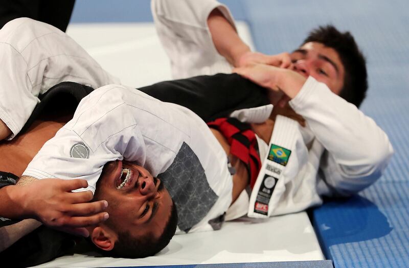 ABU DHABI,  UNITED ARAB EMIRATES , April 22 – 2019 :- Murafis Ismailov (red from Lion Academy ) vs Sultan Khamis Alameri ( blue from Baniyas Jiu Jitsu Club ) during the final of male 81 kg category in  the Abu Dhabi World Professional Jiu Jitsu  Championship 2019 held at the Mubadala Arena in Abu Dhabi. Murafis won the fight. ( Pawan Singh / The National ) For Sports. Story by Amith