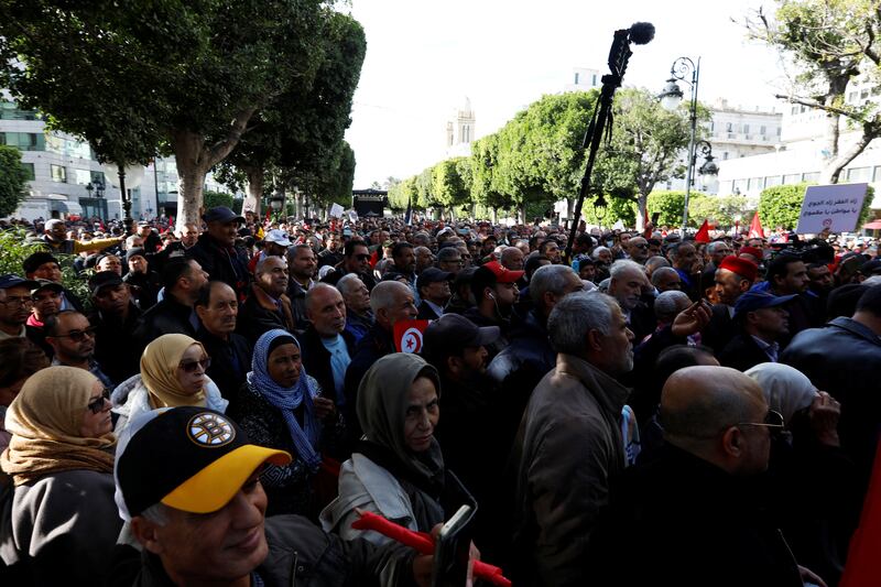 Supporters of opposition groups march in the Tunisian  capital, Tunis. Reuters