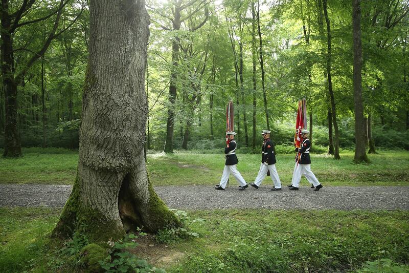 U.S. Marines walk through the former battlefield of Belleau Wood during commemorations of the 100th anniversary of the World War I Battle of Belleau Wood on Memorial Day near the Aisne-Marne American Cemetery, near Chateau-Thierry, France. Sean Gallup / Getty Images