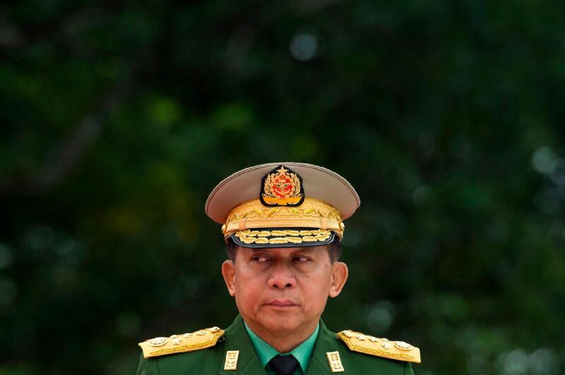 (FILES) This file photo taken on July 19, 2018 shows Myanmar's commander-in-chief, Senior General Min Aung Hlaing, attending a ceremony marking Myanmar independence hero General Aung San and eight others assassinated in 1947, during the 71st anniversary of Martyrs' Day in Yangon. Myanmar's army chief said on September 23, the United Nations had no right to interfere in the sovereignty of the country a week after UN investigators called on him and other top generals to be prosecuted for "genocide" against the Rohingya minority. / AFP / YE AUNG THU
