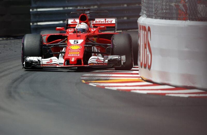 Ferrari driver Sebastian Vettel steers his car during 2017 Monaco GP. AP