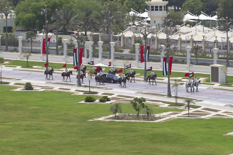 ABU DHABI, UNITED ARAB EMIRATES - July 20, 2018: Members of the UAE Armed Forces Cavalry Division escort HE Xi Jinping, President of China (in vehicle), upon his arrival at the Presidential Palace. 

( Mohamed Al Baloushi for Crown Prince Court - Abu Dhabi )
---