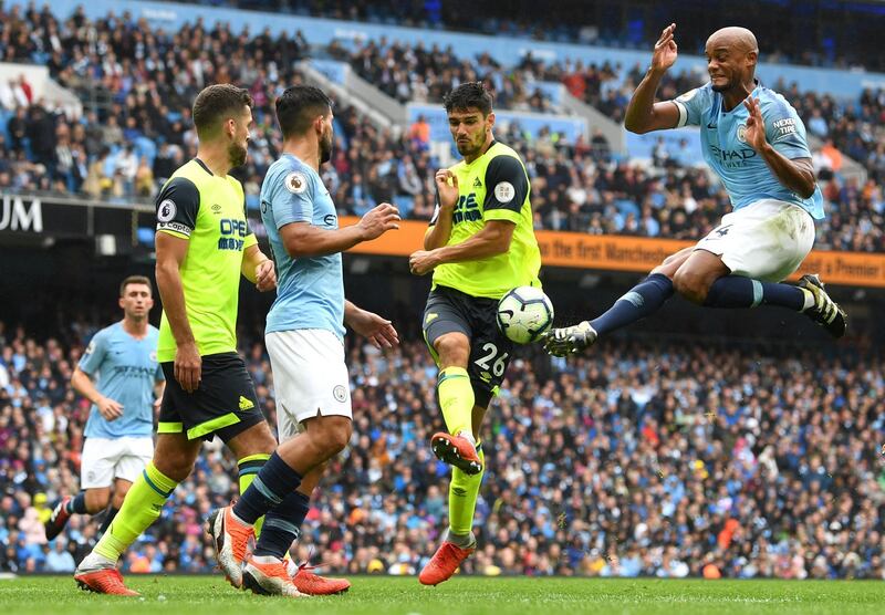 Vincent Kompany of Manchester City controls the ball in the air. Getty Images