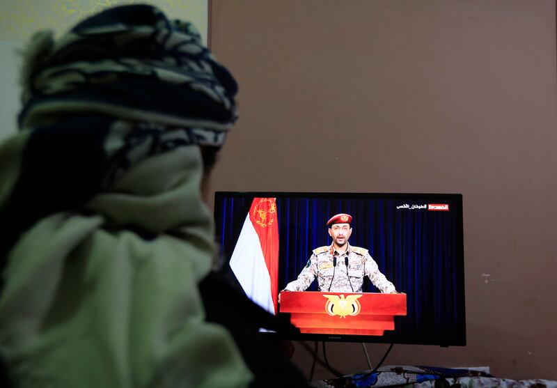 A Houthi spokesman delivers a televised statement on Monday following a missile attack on a US-owned ship in the Gulf of Aden. Weeks before the war in Gaza began, the Yemeni rebels staged a military parade in Sanaa. EPA