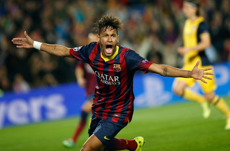 Barcelona's Neymar celebrates after scoring his side's goal during their Uefa Champions League quarter-final first leg against Atletico Madrid at the Camp Nou on April 1, 2014. Emilio Morenatti / AP Photo